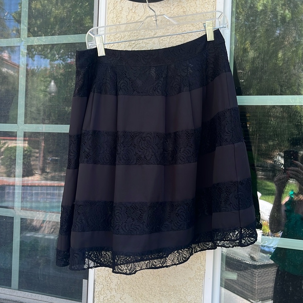 Black lace skirt by Lemieux